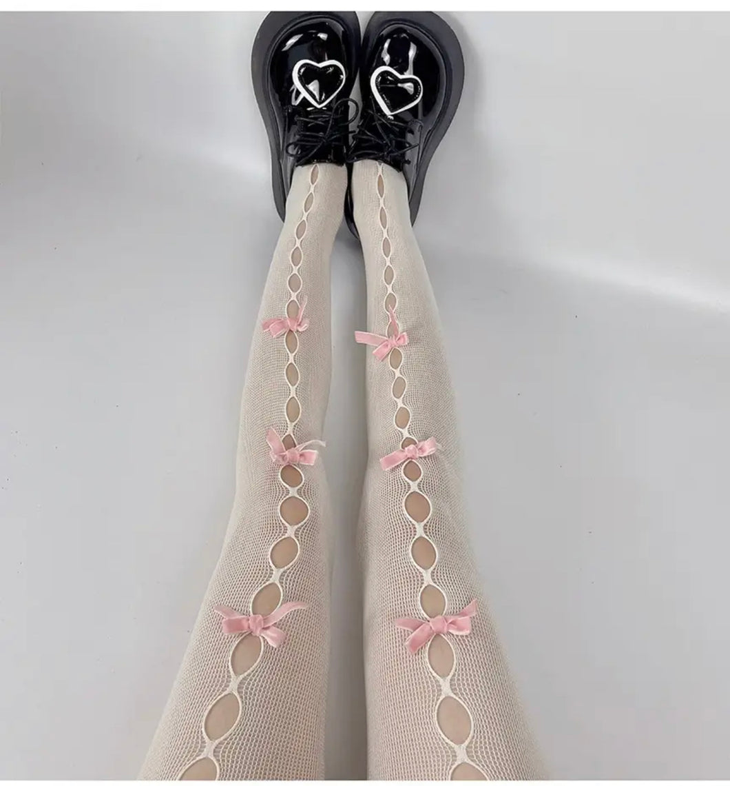 Cream tights pink bows